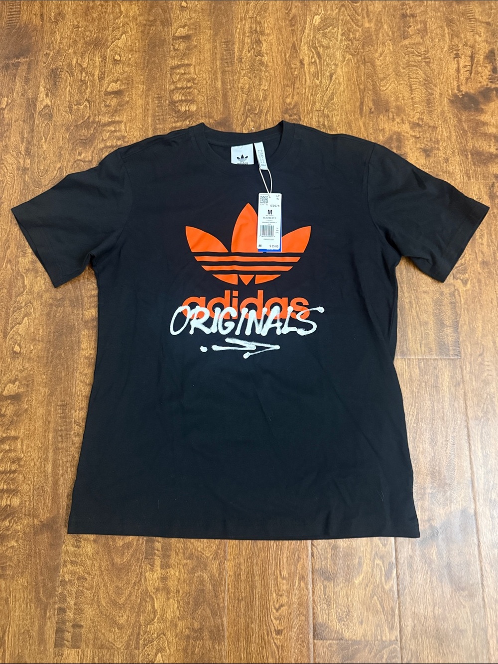 adidas Originals Black Tee with Orange Trefoil and White Script Size M